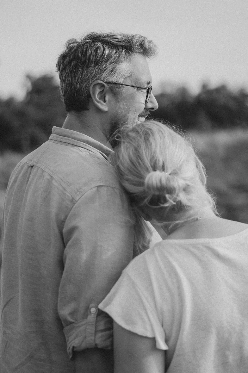 Woman resting against her partner's shoulder