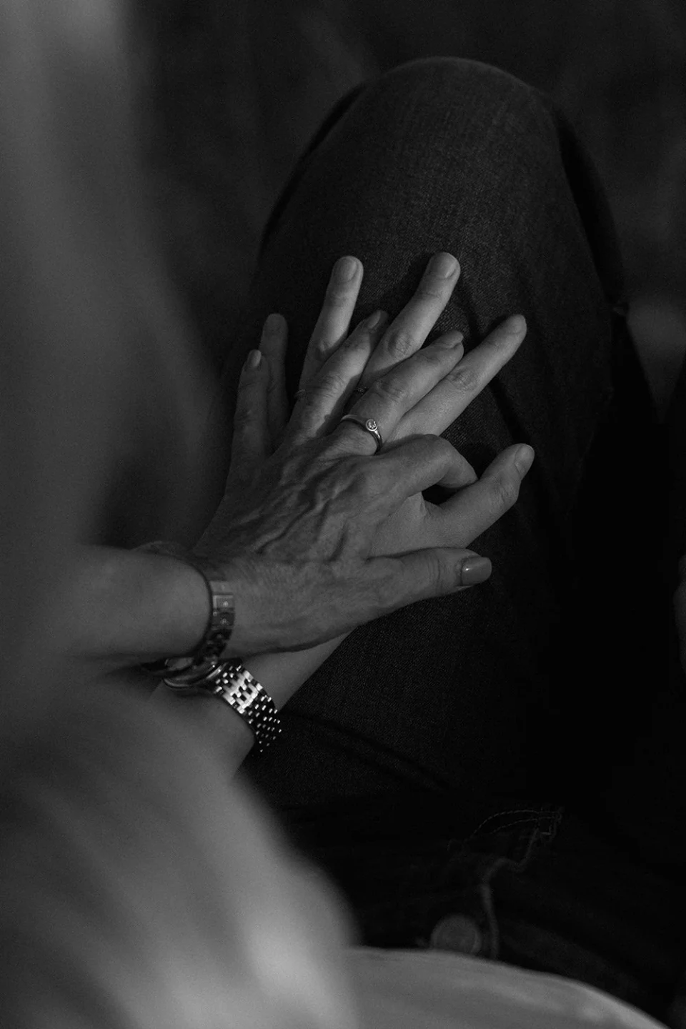 Two hands photographed from above